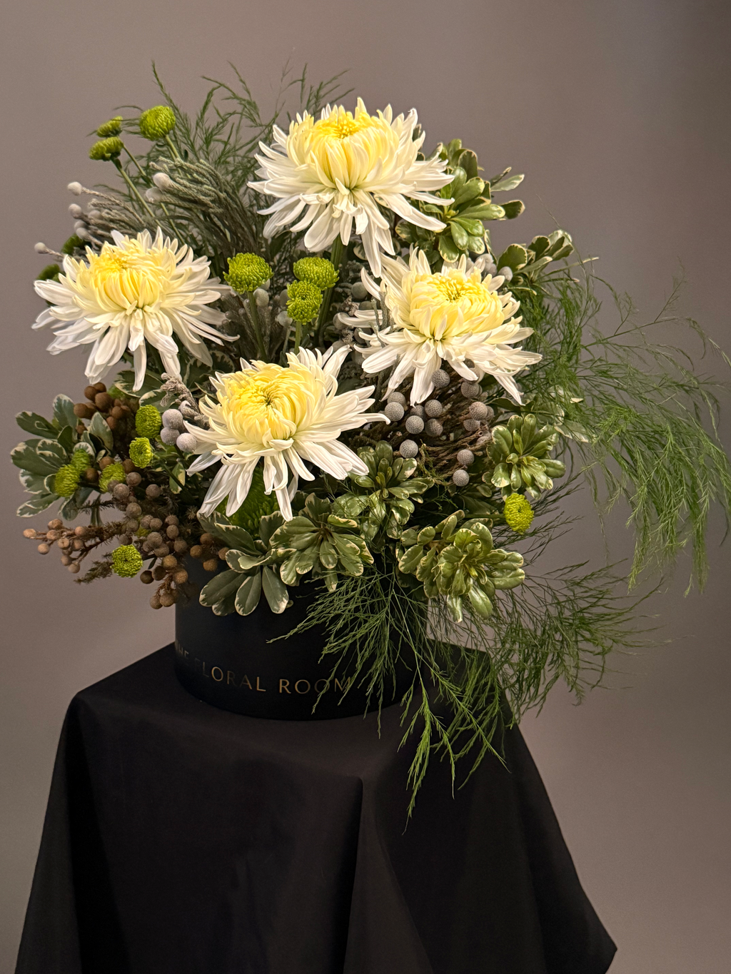 Ash Garden floral box arrangement with ivory chrysanthemums and layered greenery by The Floral Room